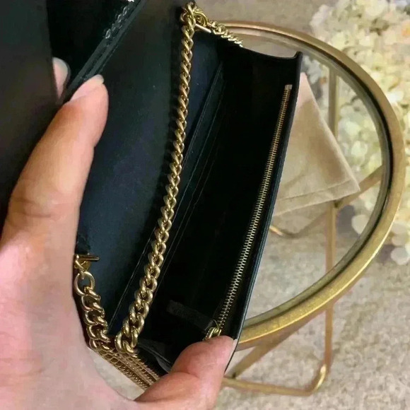 Gucci mini leather chain bag with double G stripe in black and gold. - Picture 13 of 14